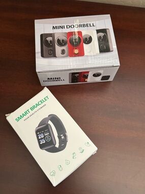 Mini Doorbell Camera & Fitness Tracker Smartwatch NEW